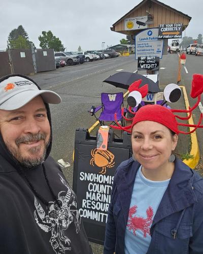 Snohomish MRC member Brie Townsend and husband Charlie Townsend helped staff July crabber outreach at the Port of Everett. (Brie Townsend).