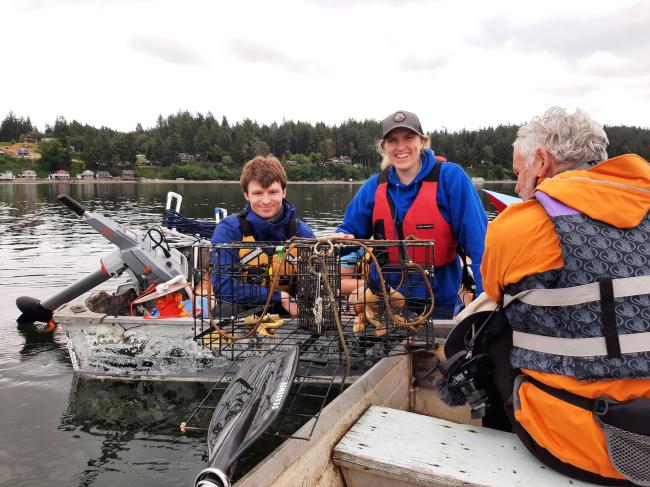 Ella Ashford recovering ghost crab pots with Jefferson MRC